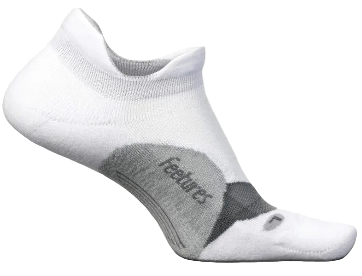 A white, low-cut athletic sock with a gray arch support band and the text 'feetures' in gray on the side, featuring a small gray 'L' logo near the toe.