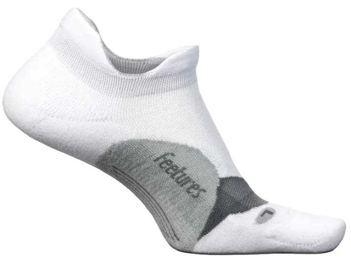 A white, low-cut athletic sock with a gray arch support band and the text 'feetures' in gray on the side, featuring a small gray 'L' logo near the toe.