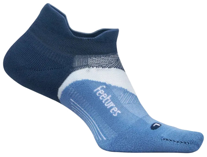 A low-cut athletic sock in shades of dark blue, light blue, and white, featuring the text Feetures on the side and an L marker on the toe.