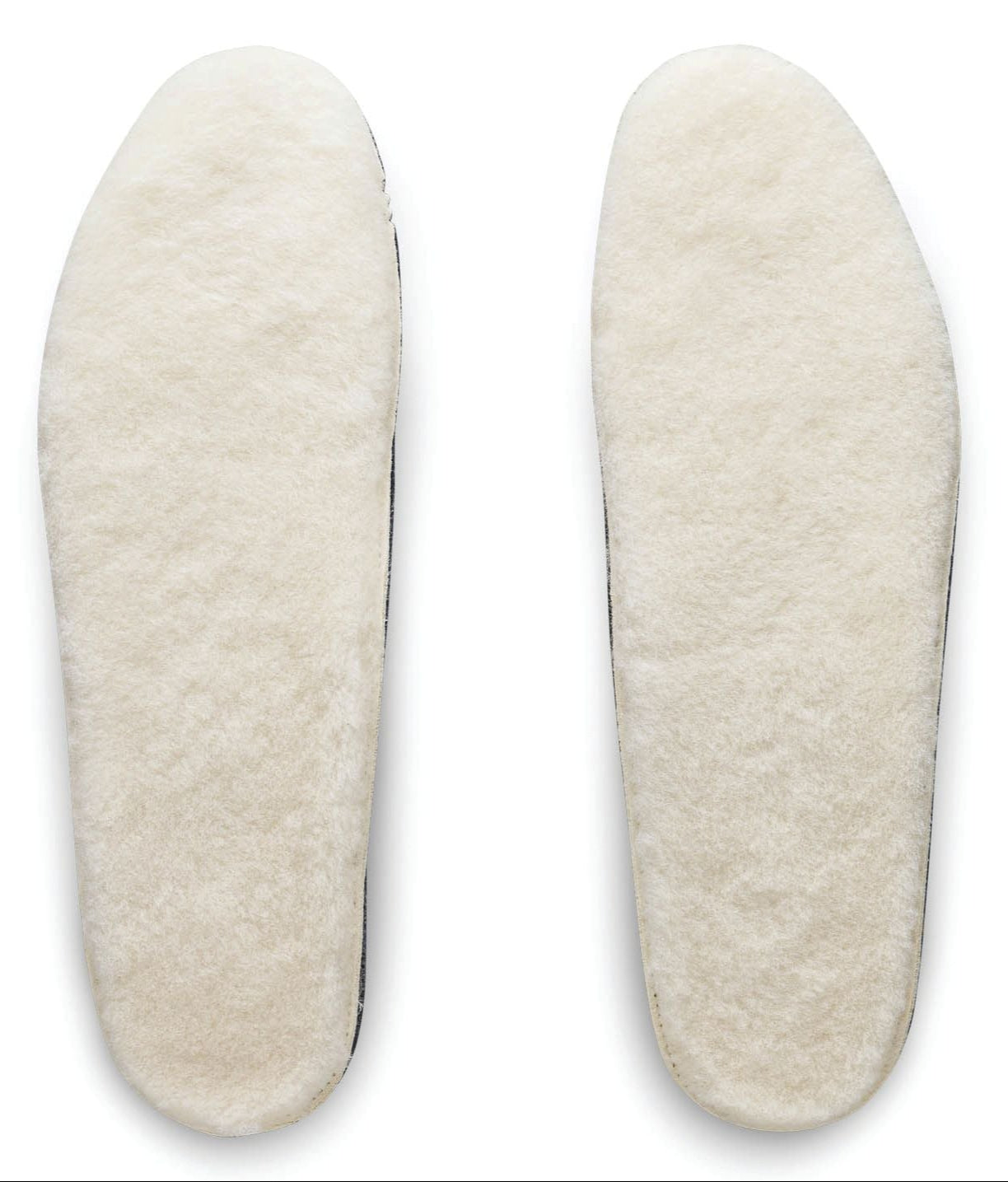 Pair of white faux fur shoe inserts.
