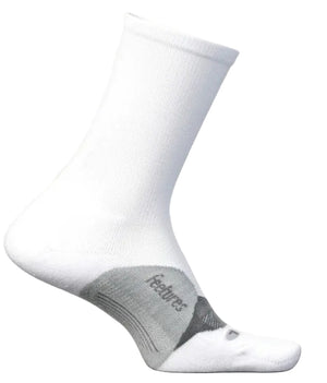 A white crew-length athletic sock with a grey arch support panel featuring the word Feetures written on the side.