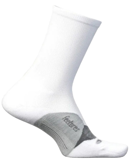 A white crew-length athletic sock with a grey arch support panel featuring the word Feetures written on the side.