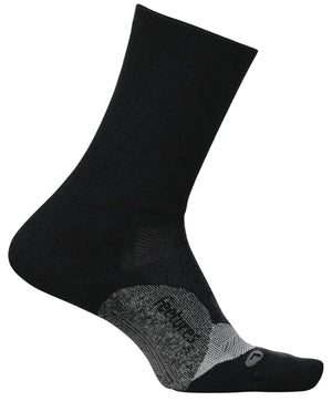 A black ankle-length athletic sock with grey textured reinforcement on the heel and arch and the word feetures printed on the side, featuring a grey L for the left foot near the toe area.