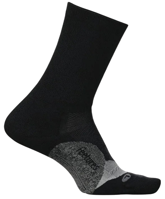A black ankle-length athletic sock with grey textured reinforcement on the heel and arch and the word feetures printed on the side, featuring a grey L for the left foot near the toe area.
