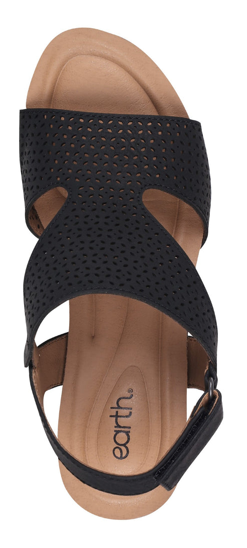 A black sandal with a light brown sole and the word "earth." on the sole.