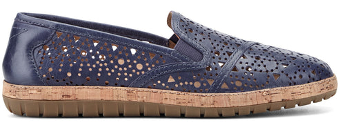A blue perforated leather slip-on shoe with a cork midsole.