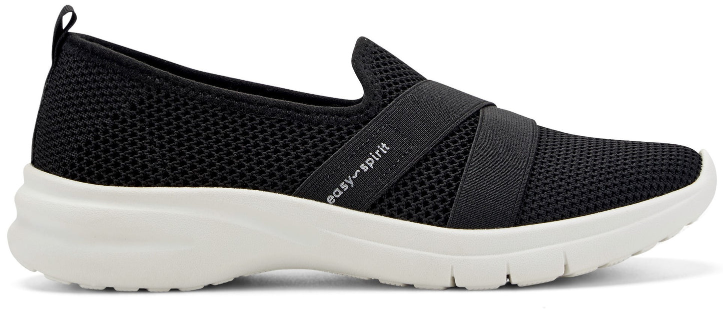 A black slip-on shoe with a white sole and the text 'easy-spirit' on its side.