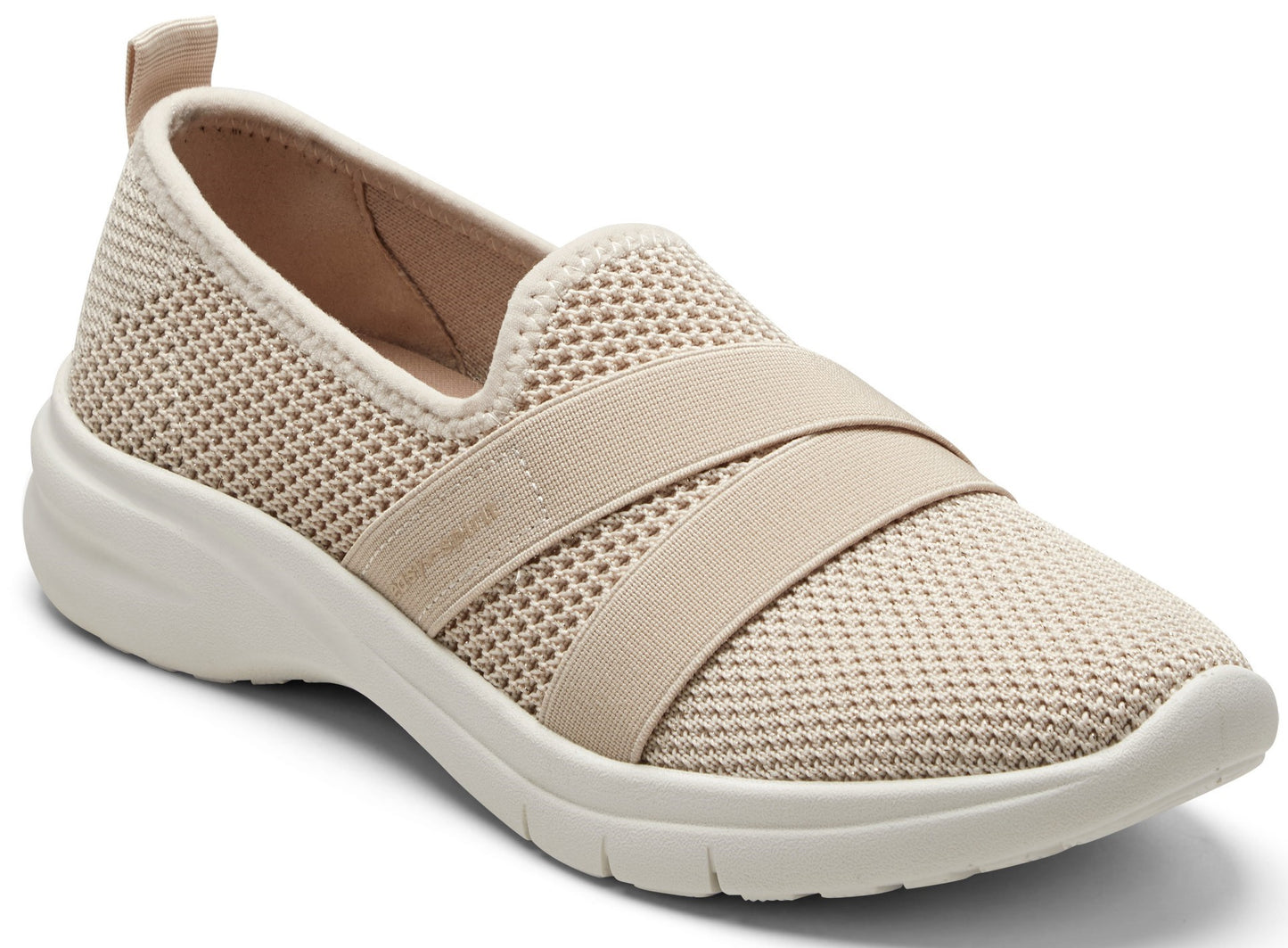 Beige slip-on shoe with elastic strap and mesh upper.