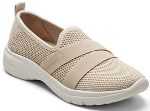 Beige slip-on shoe with elastic strap and mesh upper.