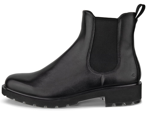 A black leather Chelsea boot with a thick lugged sole, side elastic gore panels, and a small pull tab on the back.