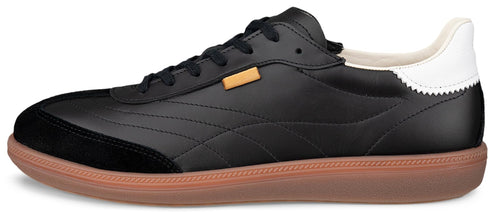 A low-top black leather sneaker with a brown sole and white heel.