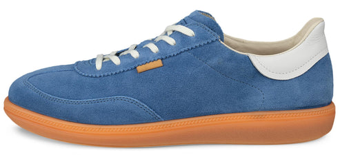 A blue suede sneaker with white laces and a white heel tab, atop a gum sole.