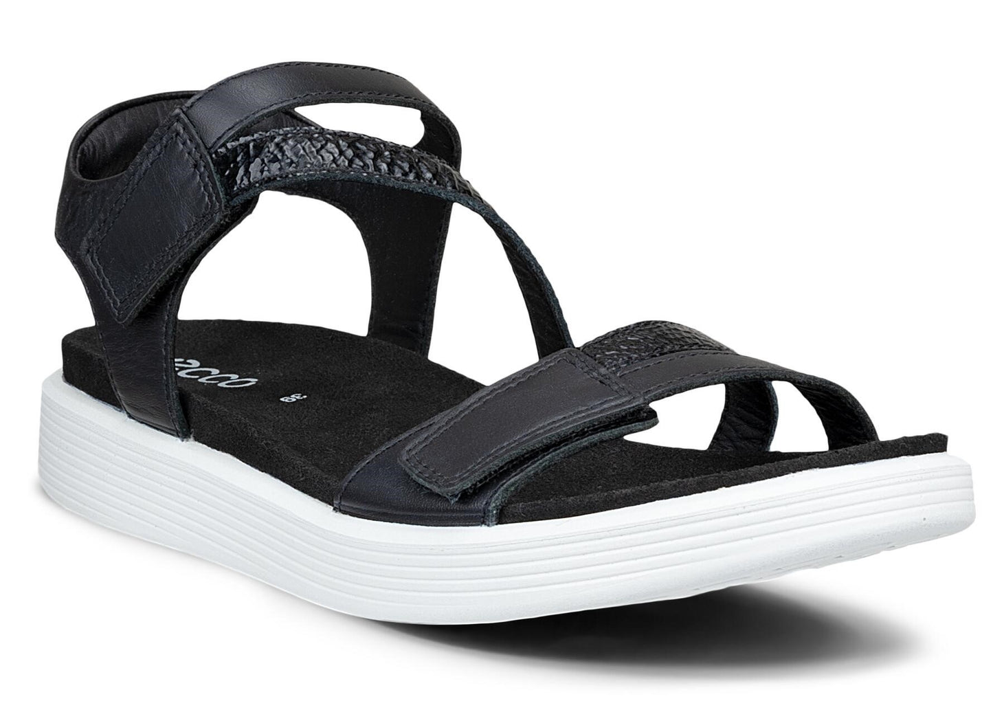 A black sandal with a white sole and a t-strap design.