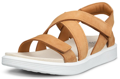 Tan sandal with cross straps and white platform sole.