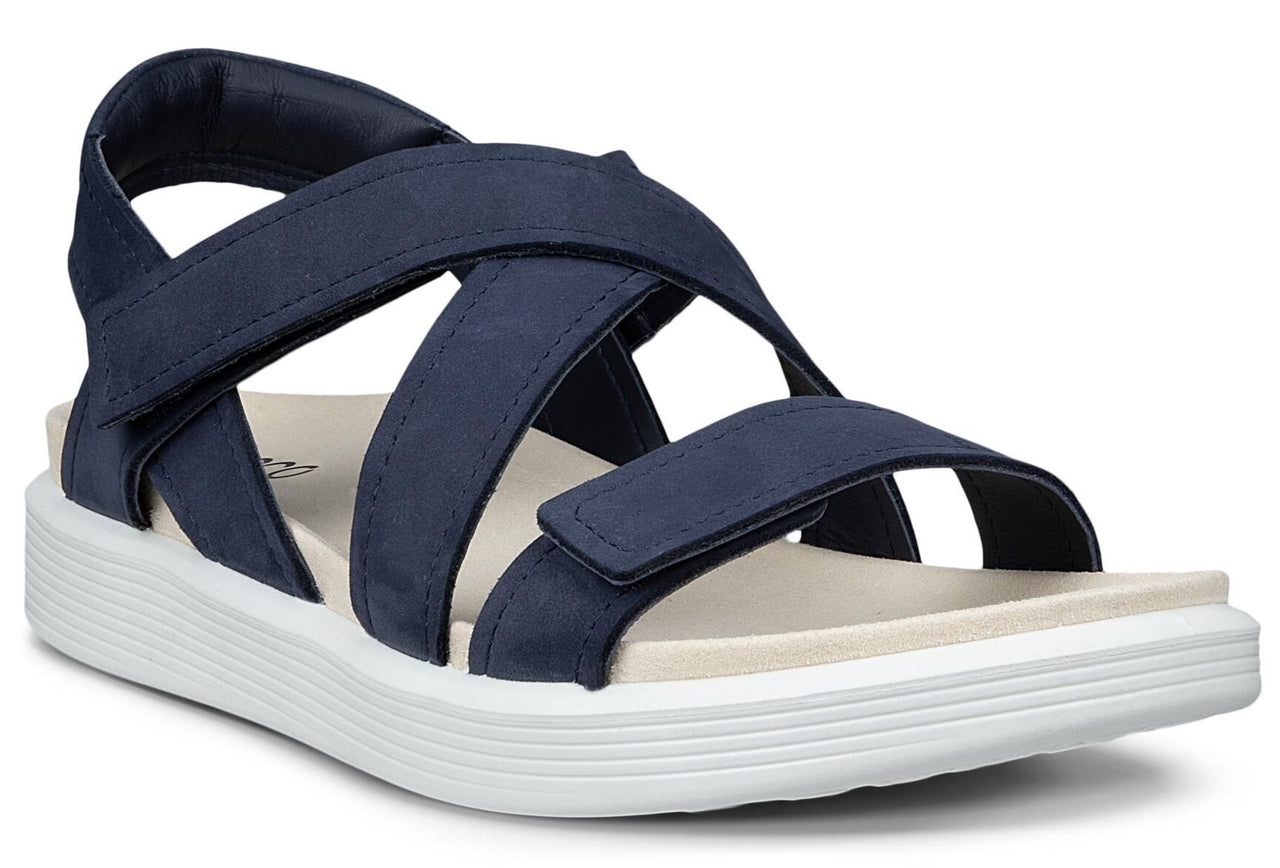Navy criss-cross sandal with white sole.