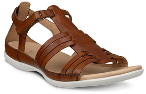 Brown leather sandal with multiple straps and white sole.