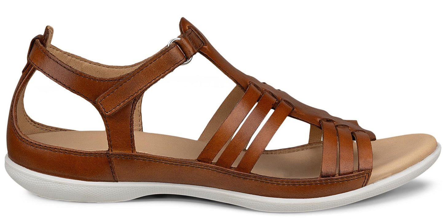 A brown leather T-strap sandal with woven straps.