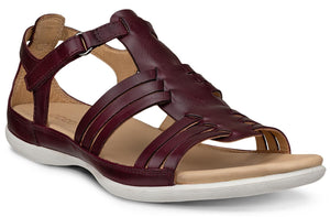 Burgundy leather sandal with adjustable ankle strap and horizontal straps across the foot.