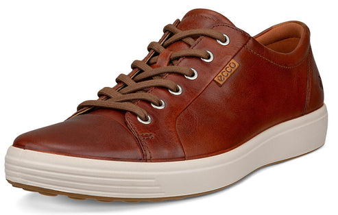 Brown leather sneaker with white sole and brown laces.
