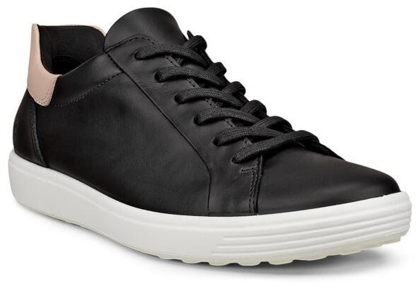 Low-top black leather sneaker with white sole and pink heel.