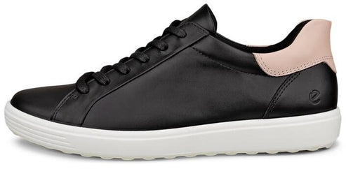 A black sneaker with a white sole and light pink accent on the heel.