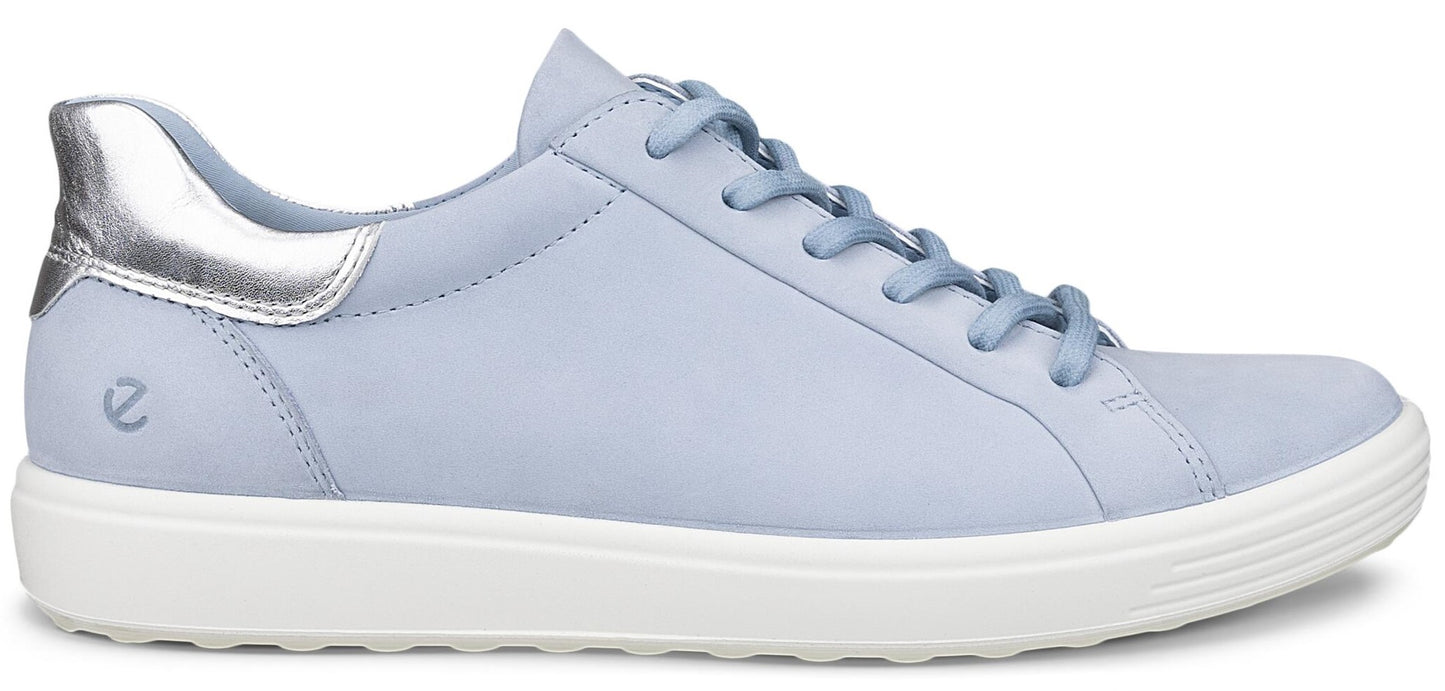 Light blue leather sneaker with white sole and silver heel.