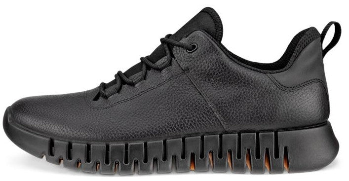 Black leather sneaker with black laces and a thick, textured sole.