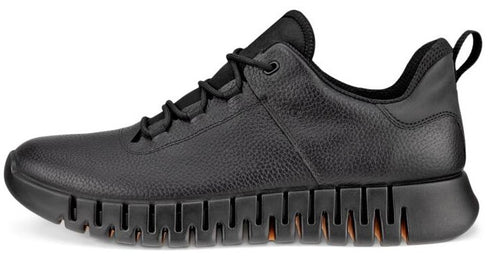 Black leather sneaker with black laces and a thick, textured sole.