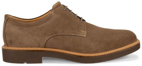 a brown suede dress shoe