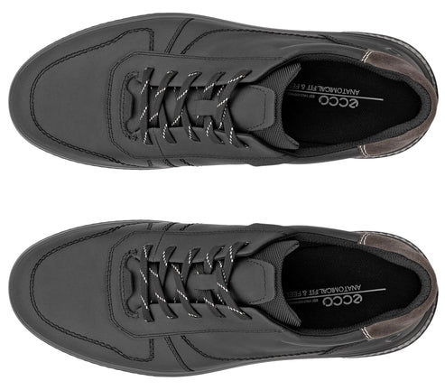 A pair of dark grey leather casual sneakers viewed from directly above, showing lace-up closures and branded insoles that read ECCO Anatomical Fit & Feel.