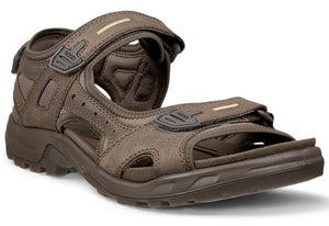 Brown, adjustable sandals with velcro straps.