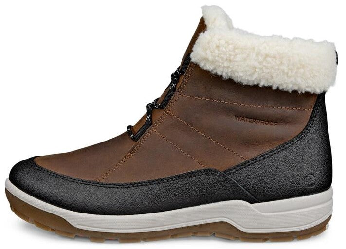 Brown waterproof ankle boot with black sole and white sherpa collar.