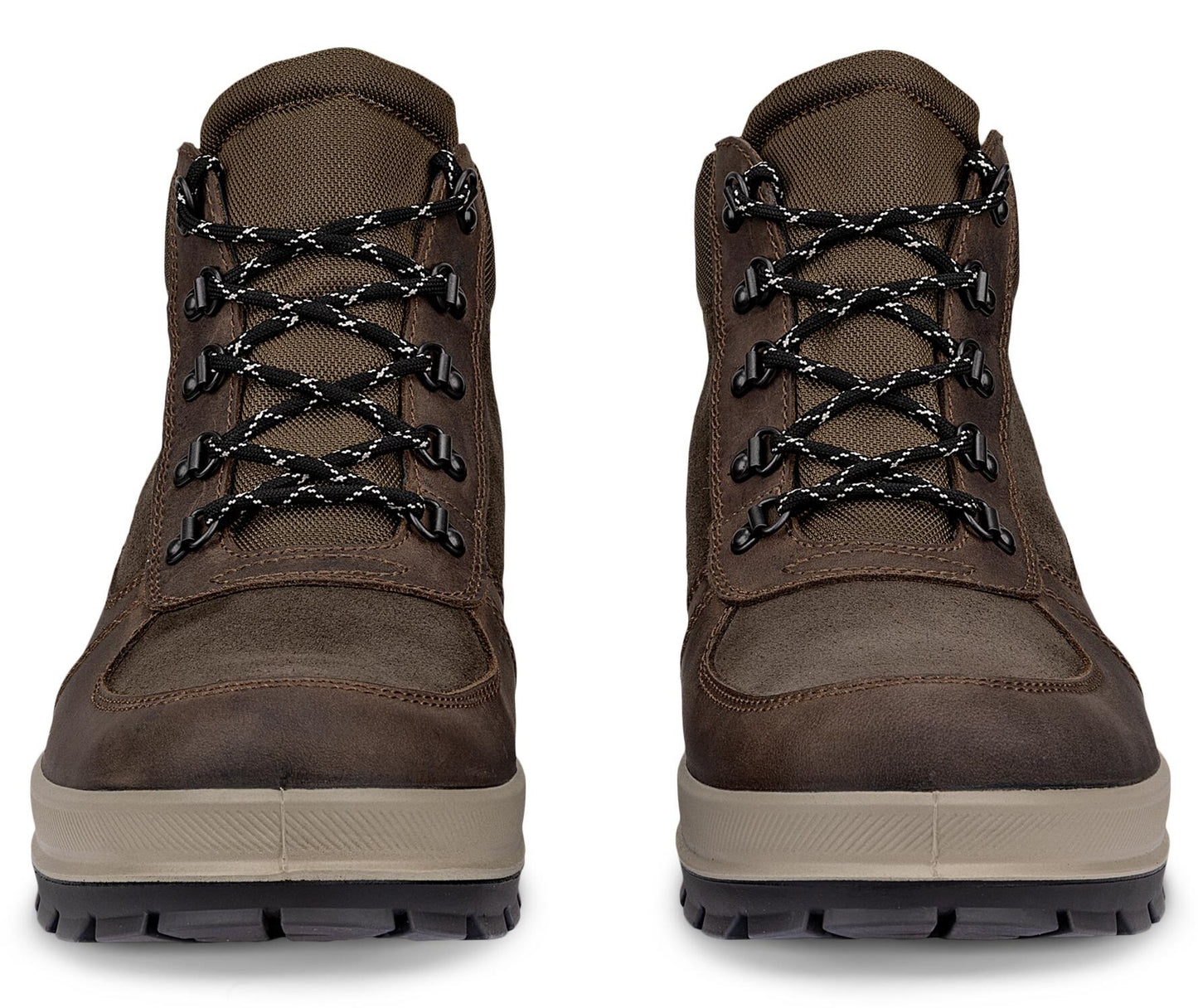 A pair of brown leather hiking boots with laces and thick, light-colored soles shown from the front.