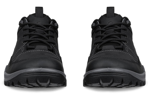 A pair of black, lace-up outdoor shoes with textured outsoles viewed from the front, showcasing their rounded toes and padded tongues.