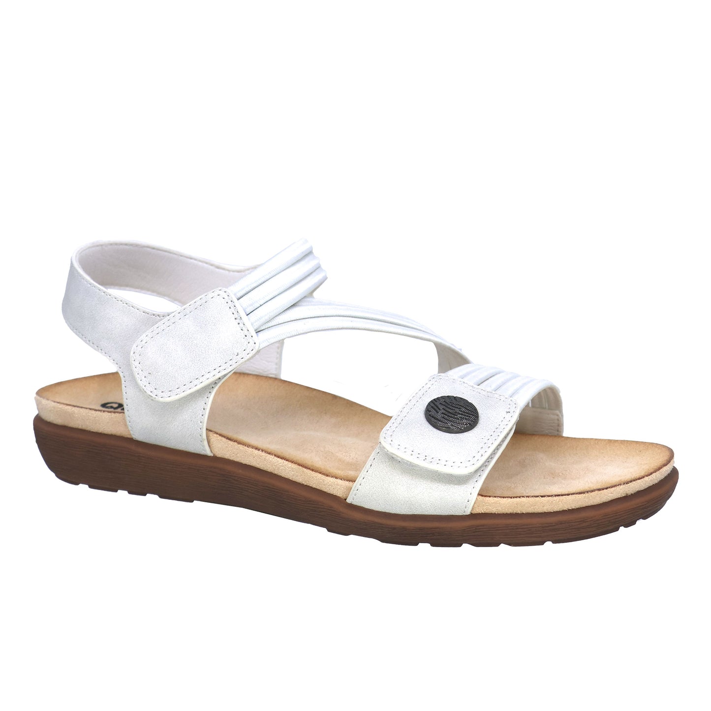 White sandal with adjustable straps and brown sole.