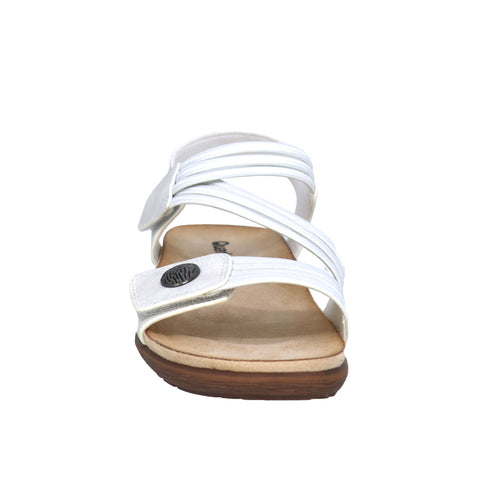 White sandal with crisscrossing straps and adjustable velcro closures.