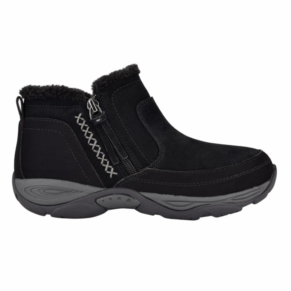 Black ankle boot with faux fur trim and side zipper.