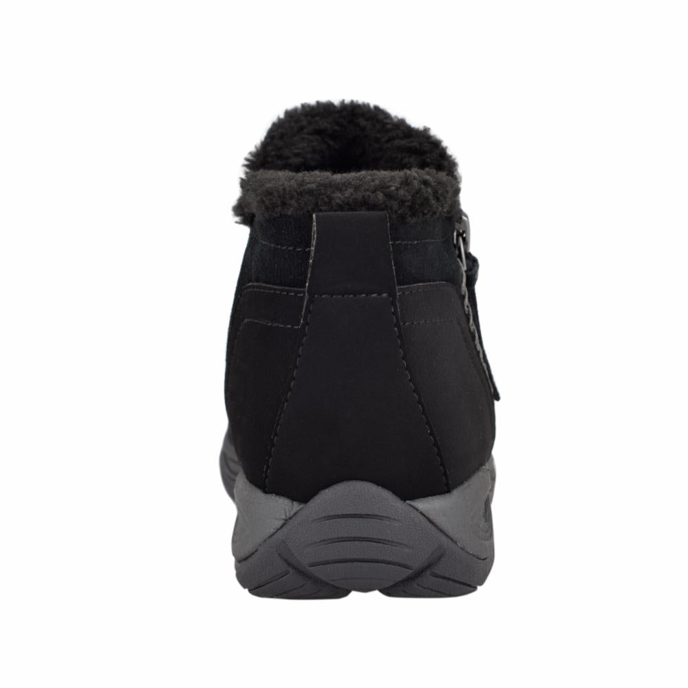 Rear view of a black ankle boot with dark gray faux fur trim at the top.