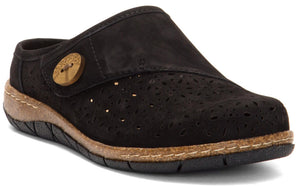 A black slip-on clog with a round wooden button.