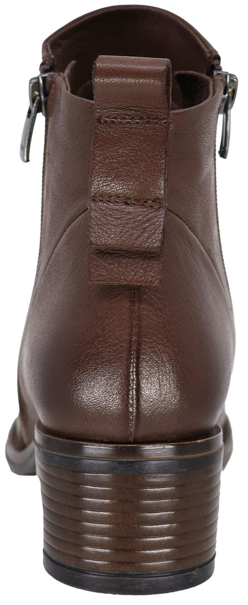 A back view of a brown leather ankle boot with a low, stacked-look heel and a vertical tab on the heel collar.