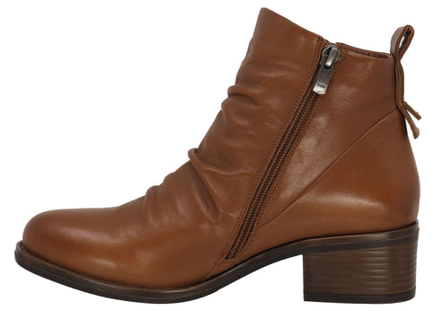 Ankle-high light brown leather boot with a side zipper and a short heel.