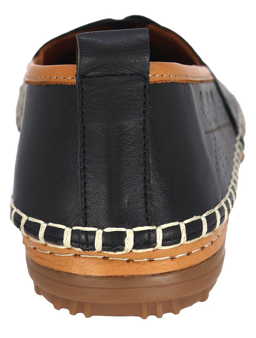 Close-up of the back of a black leather loafer with a brown accent stripe on the top and bottom, white stitching and a rubber sole.