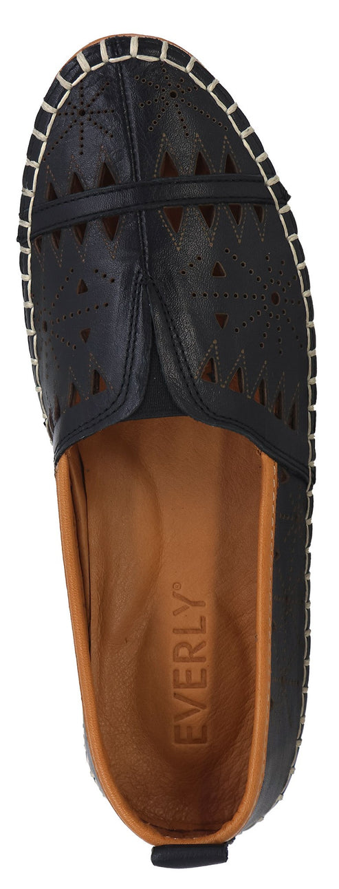 A black slip-on shoe with laser cut details and an EVERLY branded insole.