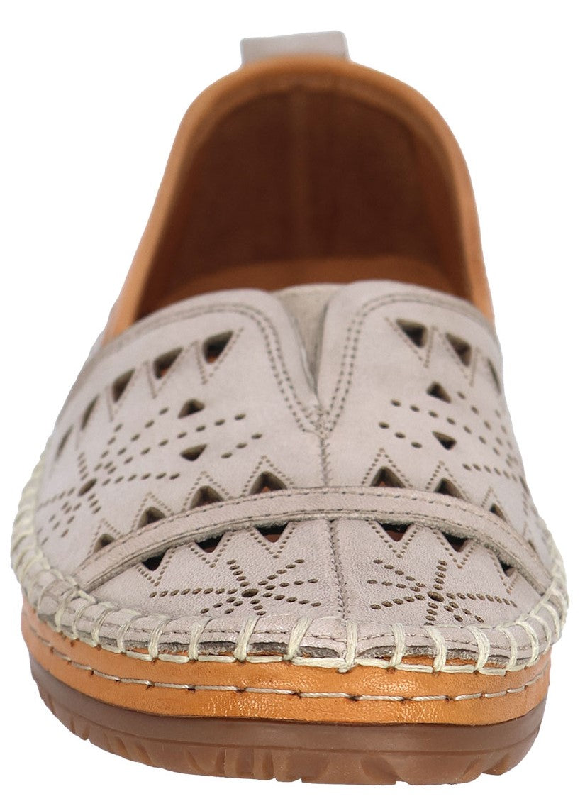 Beige leather slip-on shoe with decorative cutouts.