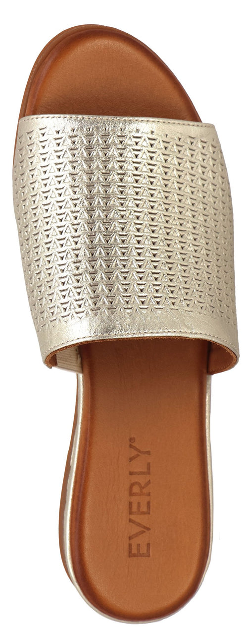 A gold sandal with geometric perforations, and the text "EVERLY" visible.