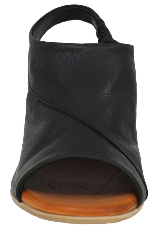 Black leather slingback sandal with peep toe and cross-over straps.