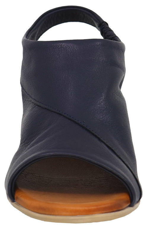 Navy blue open toe slingback shoe with light brown platform sole.