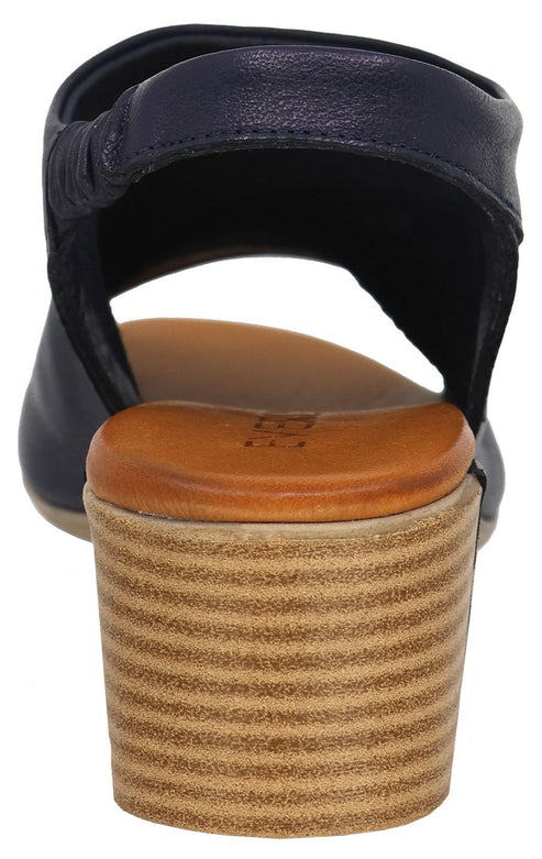 Back view of navy blue leather sandal with a block heel.