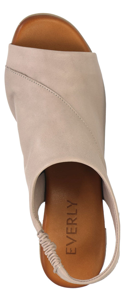 A peep-toe sandal in light tan with the word EVERLY visible on the shoe bed.
