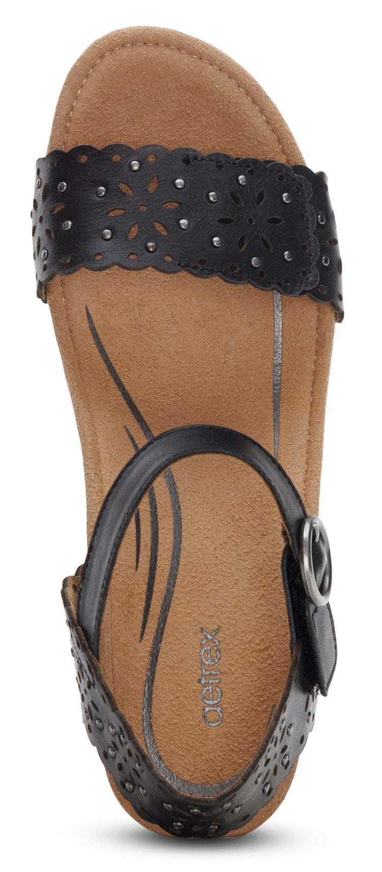 A black sandal with a tan insole and laser cut details.